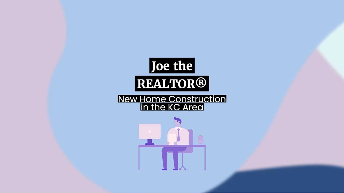 real estate agent sitting at a desk