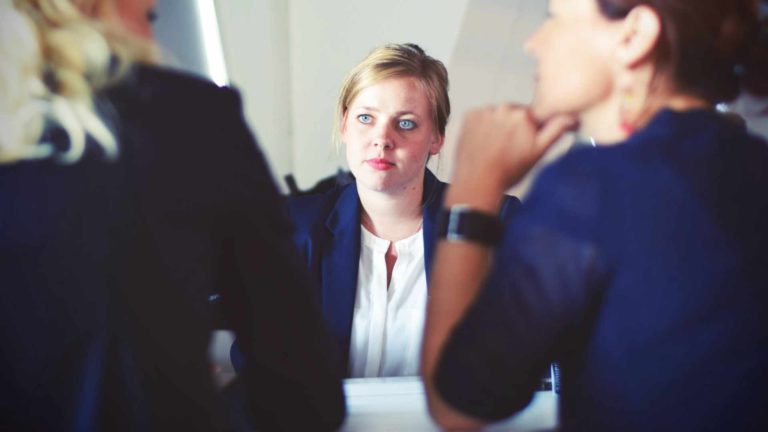 a person talking to people