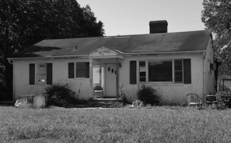 a distressed home in a town