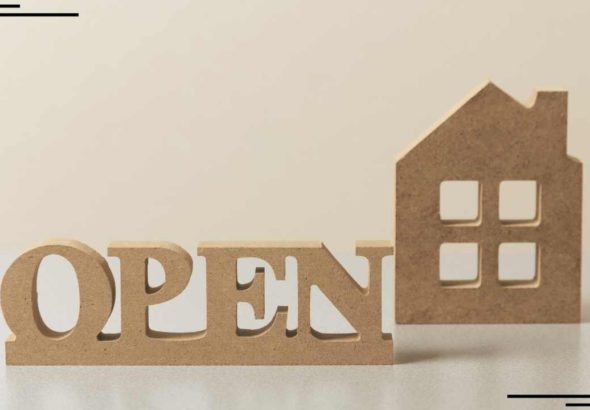 the word open right next to a house