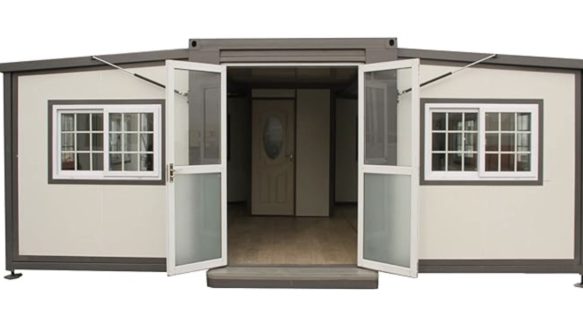 a front view of a tiny home with the door open